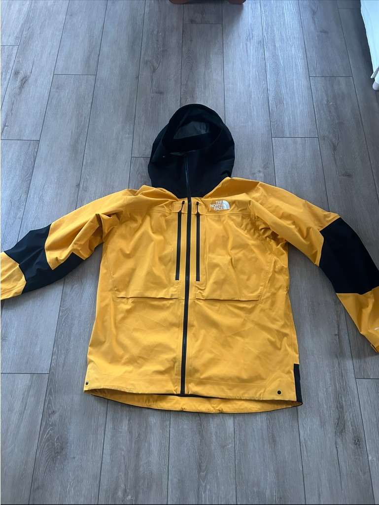 The North Face Yellow And Black Hooded Shell Jacket